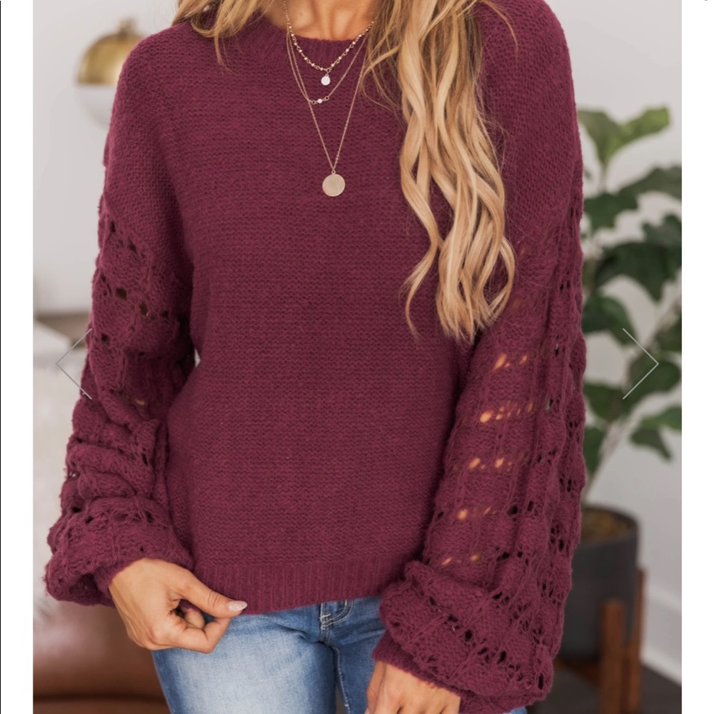 She’s the center of attention purple sweater